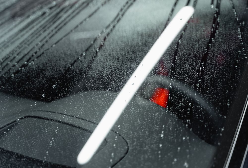 Effet miroir sur une carrosserie lustrée